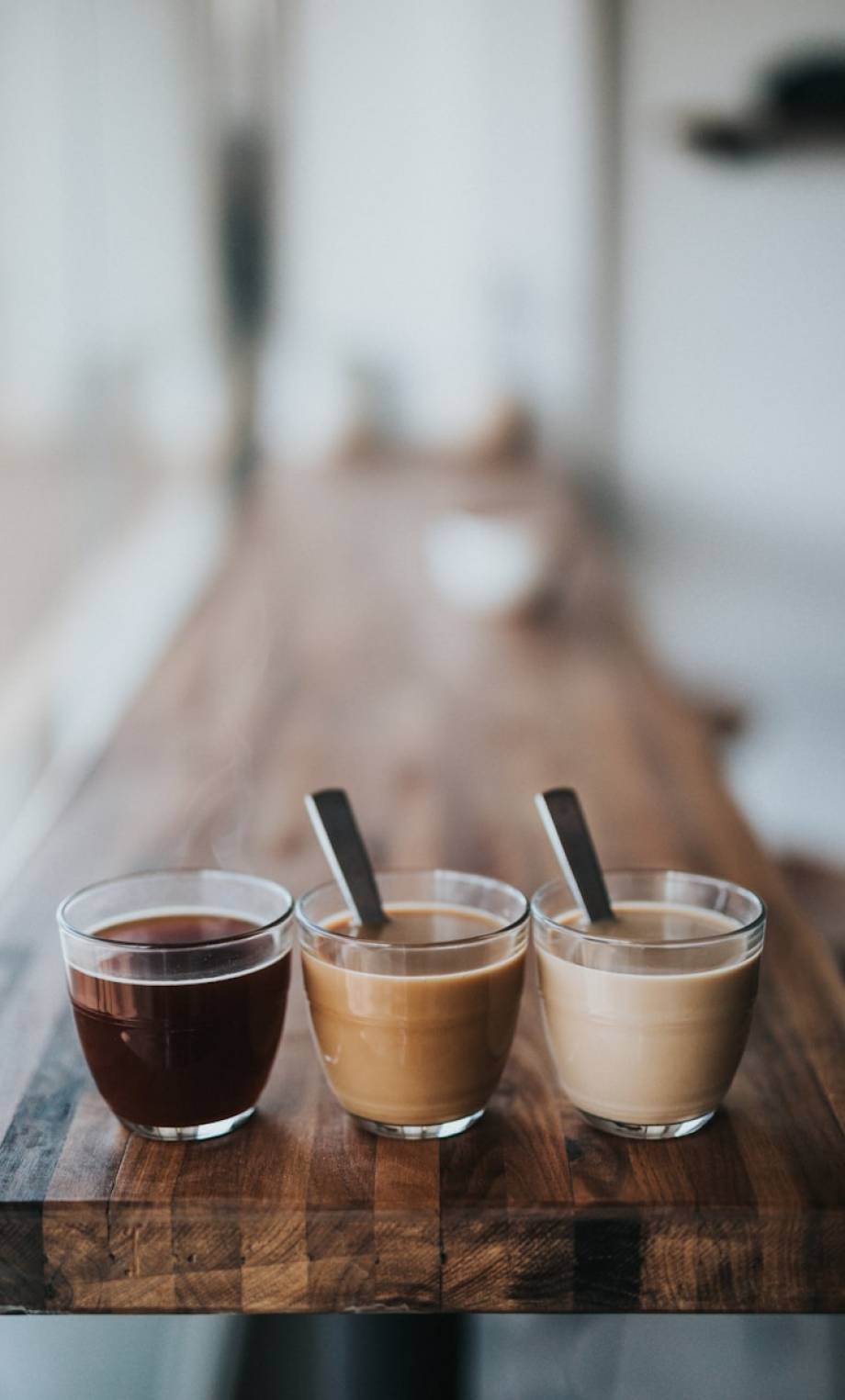 Photo by Nathan Dumlao macro photography of three assorted liquids
